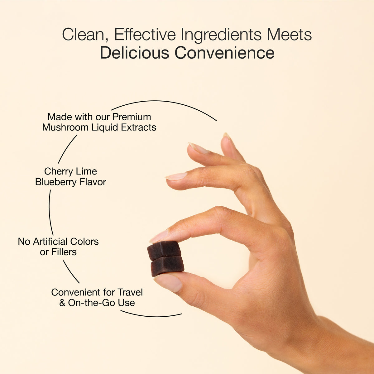 Hand holding a gummy cube with text about its ingredients and benefits on a beige background