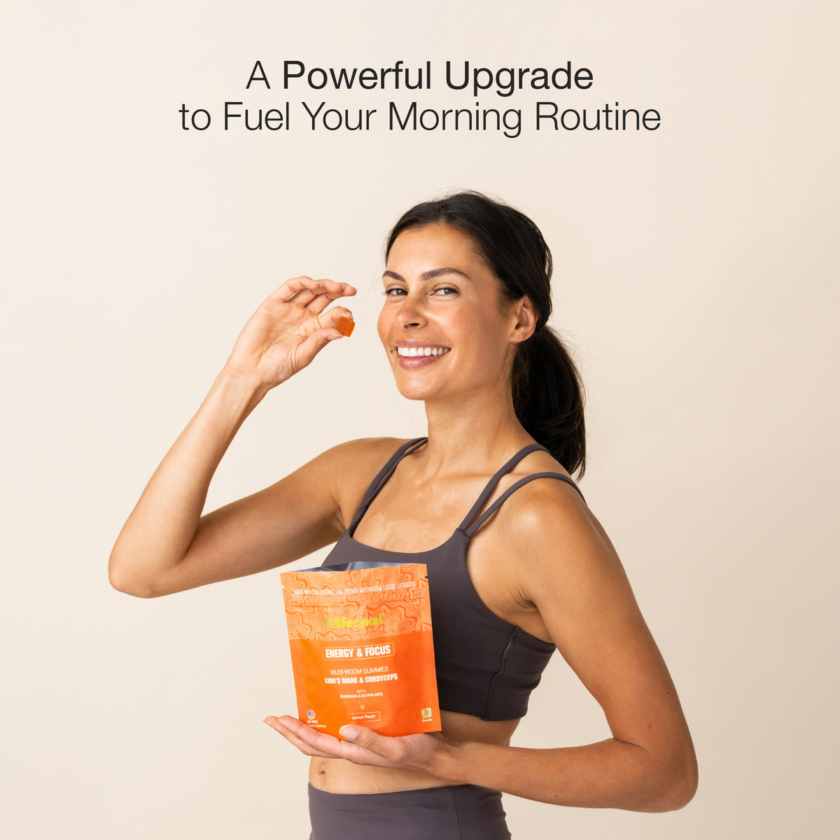 Woman holding a Lifecykel gummy supplement package with text about fueling morning routine