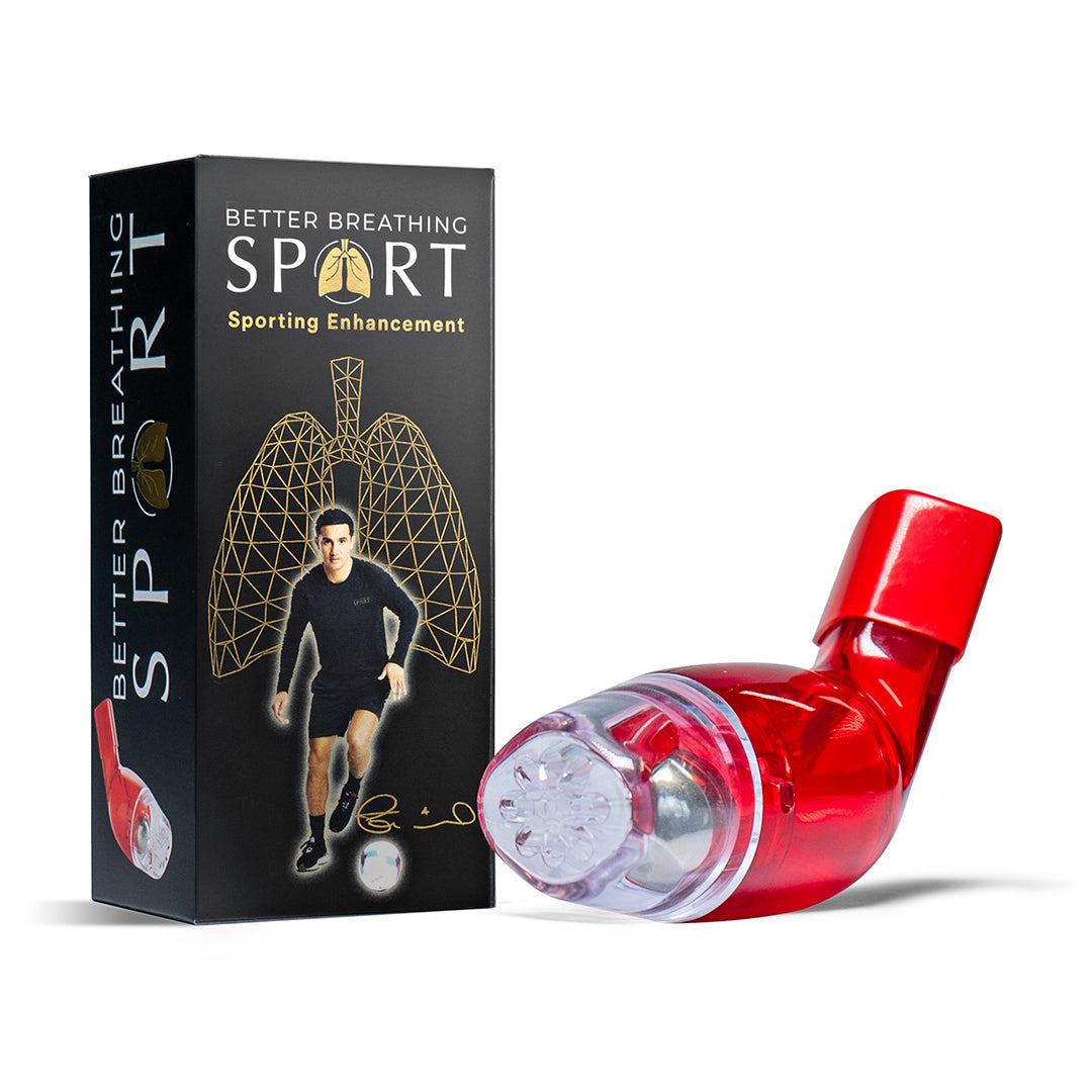 Red breathing device with black packaging box in plain white background