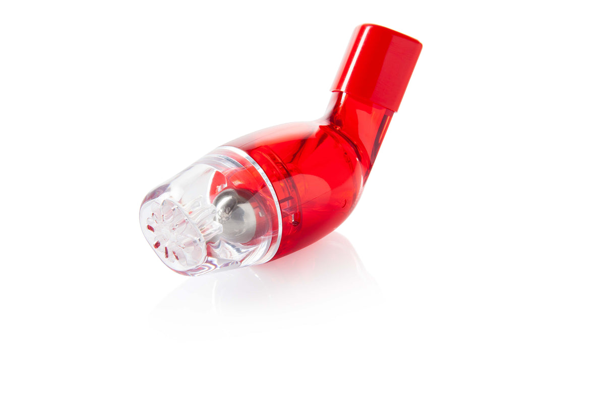 Red breathing device in plain white background