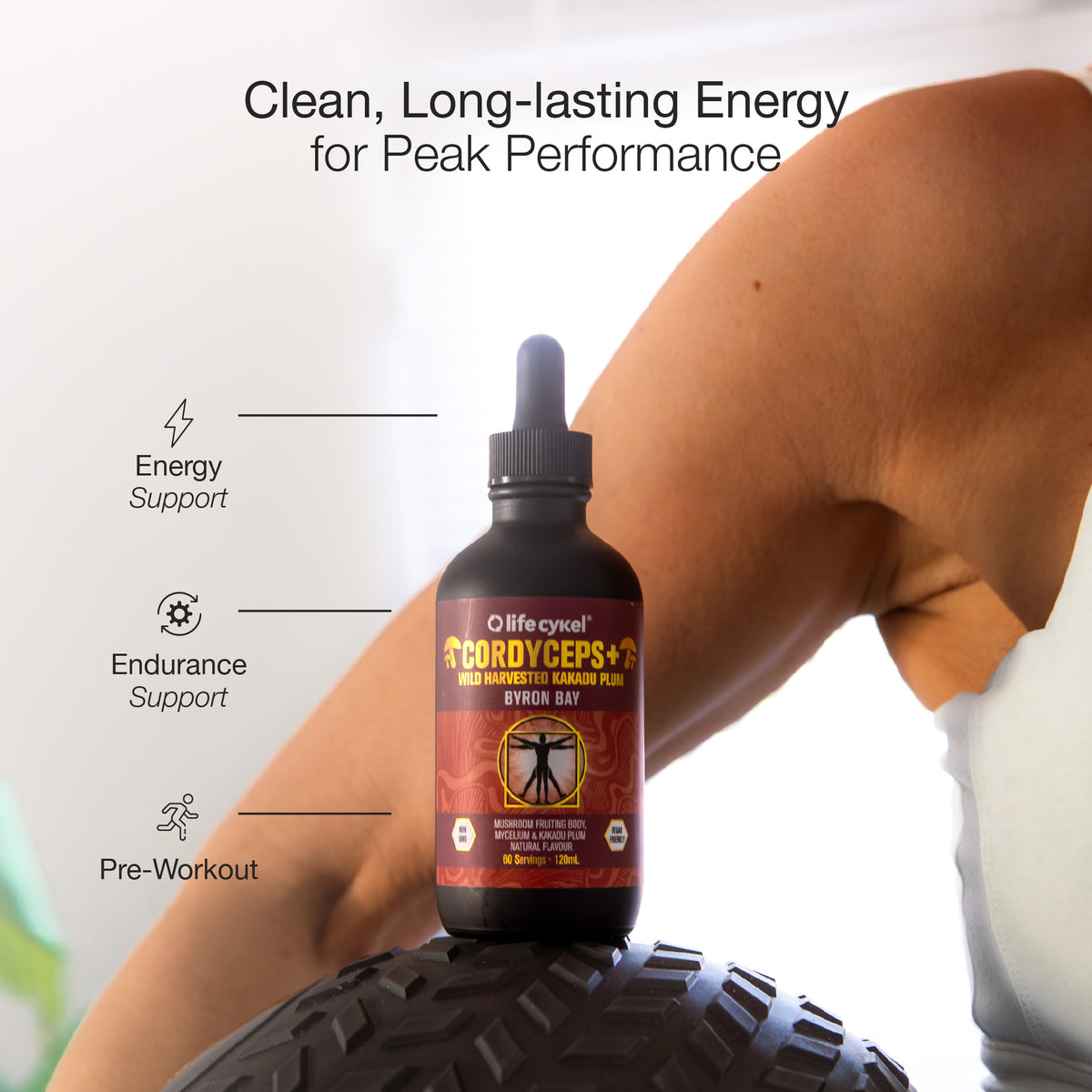 Bottle of Lifecykel Cordyceps mushroom extract supplement with a person exercising in the background