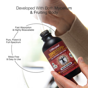 Bottle of Lifecykel Cordyceps mushroom extract supplement with text highlighting features, held by a hand.