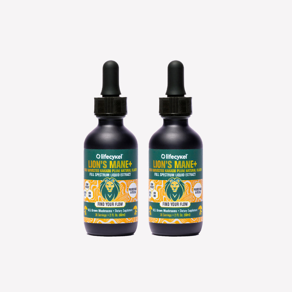 Two bottles of Lifecykel Lion's Mane mushroom extracts supplement with droppers on a white background
