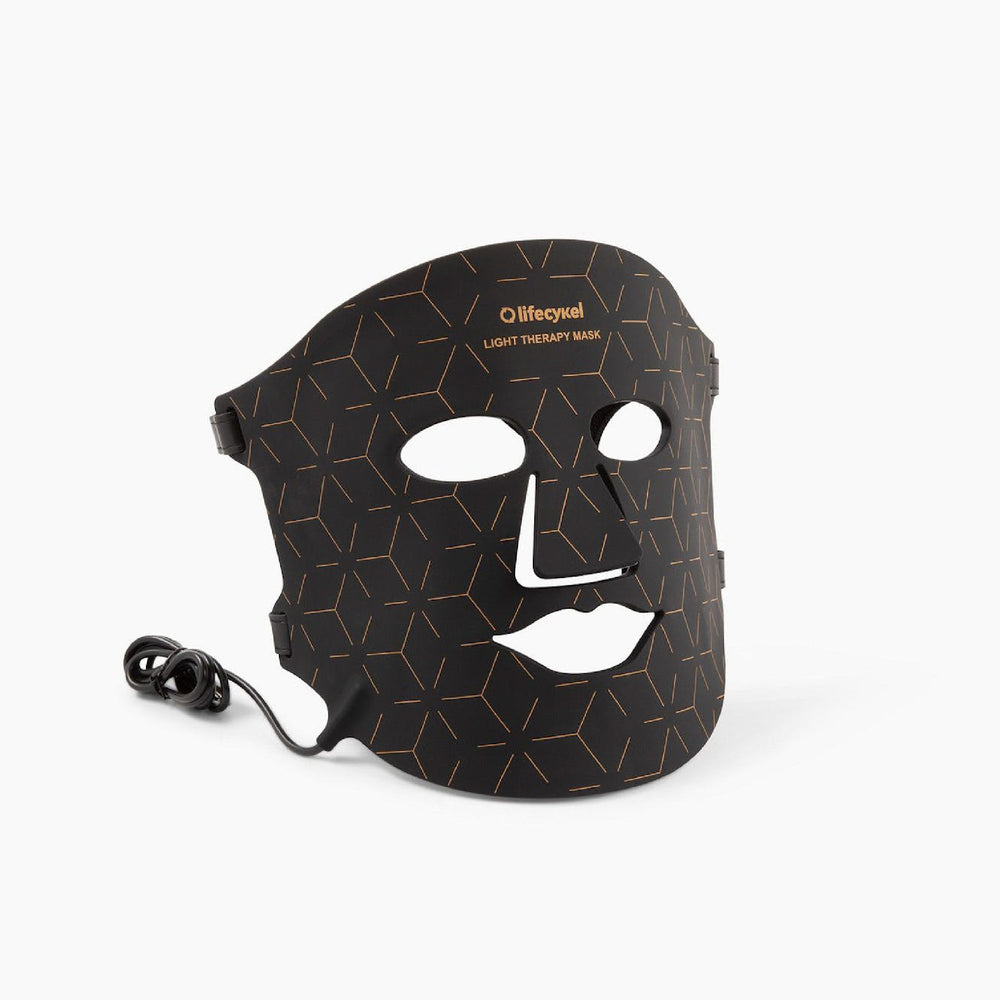 Black light therapy mask with geometric pattern on a white background