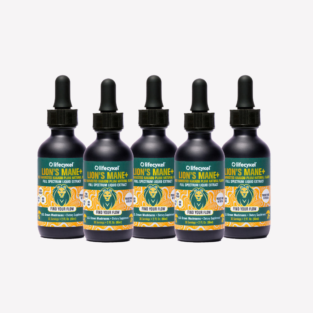 Five bottles of Lifecykel Lion's Mane+ mushroom extract supplement on a white background