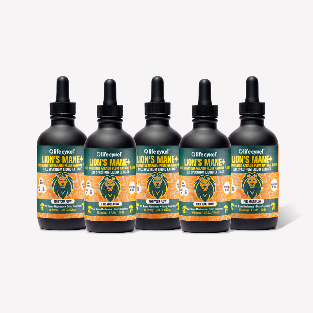Five bottles of Lifecykel Lion's Mane+ mushroom extract supplement on a white background