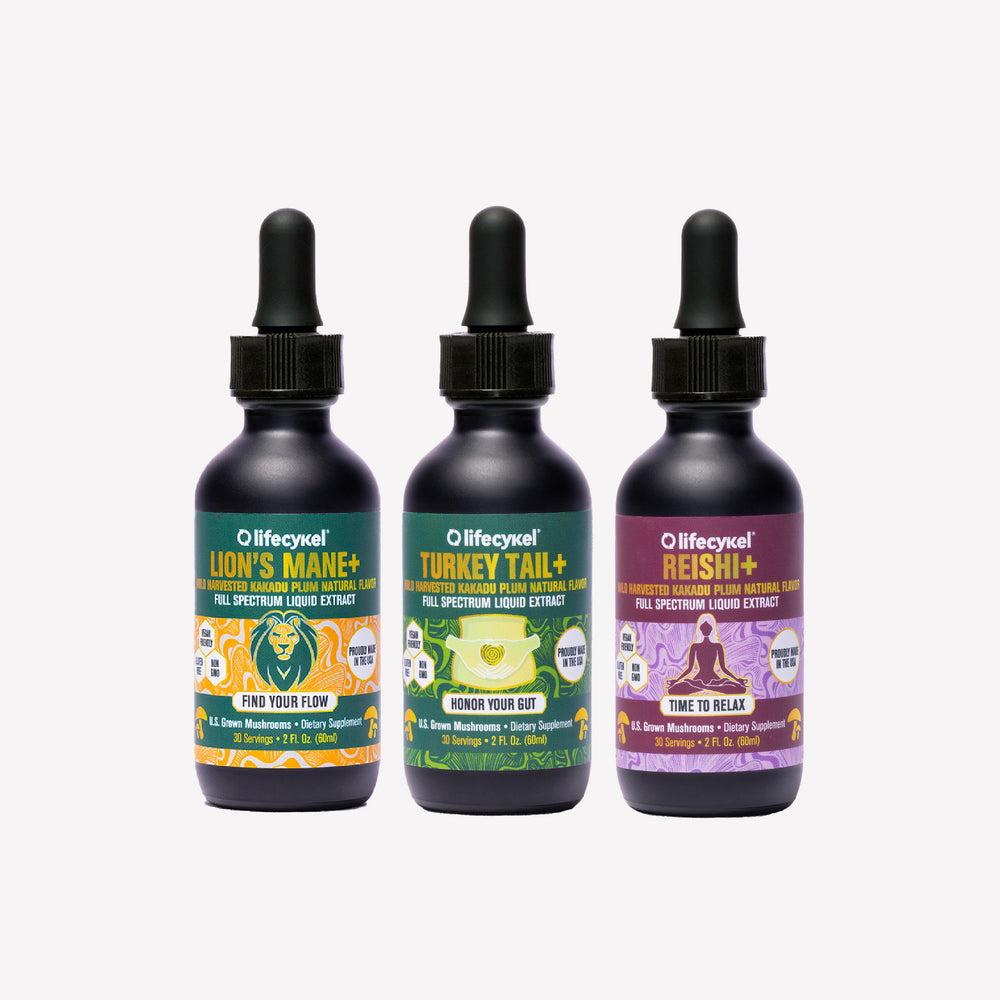 Three black bottles of Lifecykel mushroom extracts supplements on a white background
