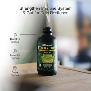Bottle of Lifecykel Turkey Tail Mushroom extract supplement on a wooden surface with text about immune system and gut health.