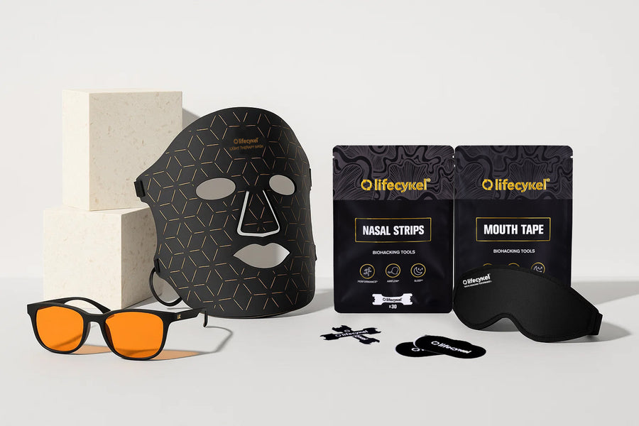 Collection of lifestyle products including a face mask, sunglasses, and packaging on a white background